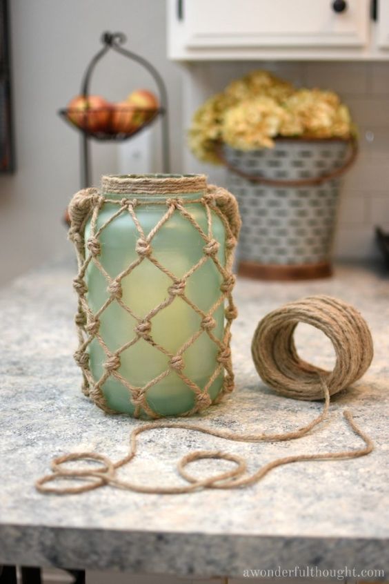A DIY rope lantern kept on a kitchen counter 